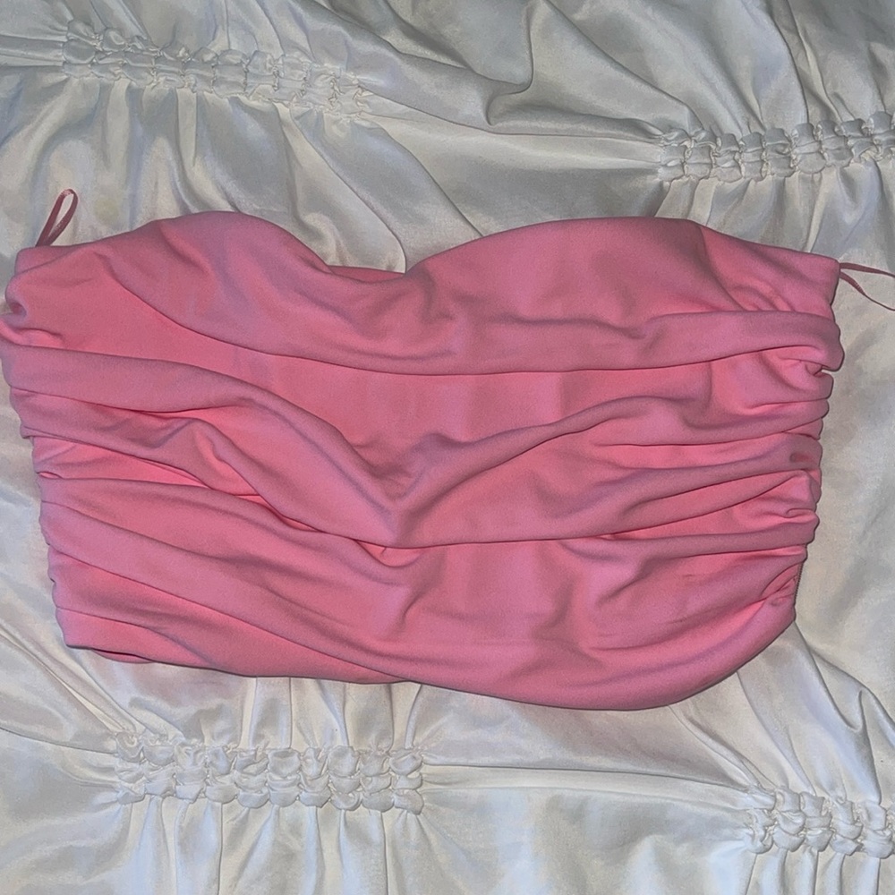 Bright pink mini strapless top with ruffle like pattern